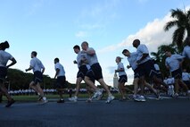 JOINT BASE PEARL HARBOR-HICKAM, Hawaii – Members of Joint Base Pearl Harbor-Hickam run in formation during the Warrior Run here, Nov. 5. This month, the Warrior Run  was hosted by Colonel Robert Dague, 15th Wing vice commander. (U.S. Air Force photo/Senior Airman Gustavo Gonzalez)