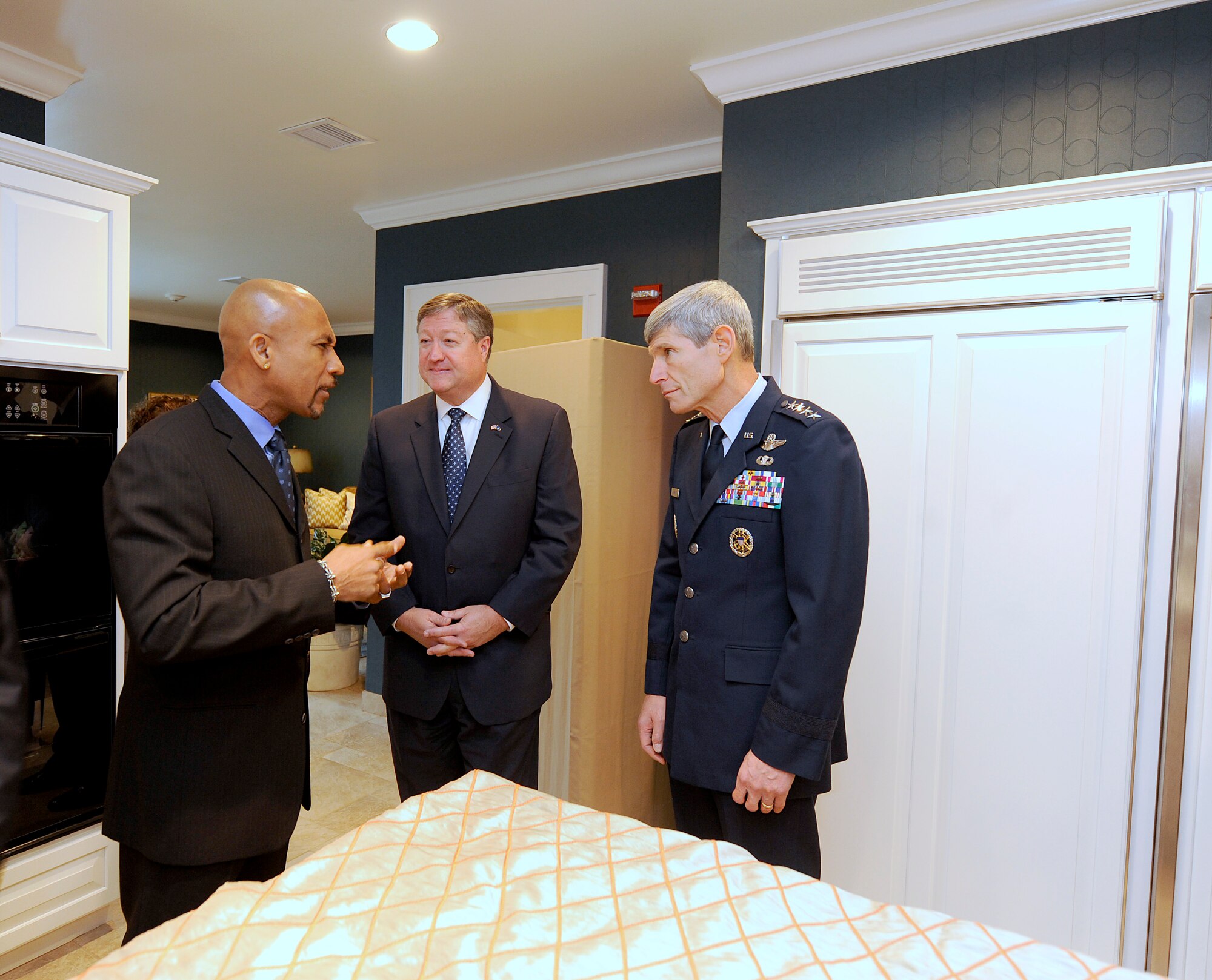 Celebrity talk show host Montel Williams talks with Secretary of the Air Force Michael Donley and Air Force Chief of Staff Gen. Norton Schwartz at Dover Air Force Base, Del., on Nov. 10, 2010.  The three helped dedicate the new Fisher House for Families of the Fallen during a ceremony there.  (U.S. Air Force photo/Scott M. Ash)
