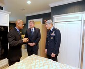 Celebrity talk show host Montel Williams talks with Secretary of the Air Force Michael Donley and Air Force Chief of Staff Gen. Norton Schwartz at Dover Air Force Base, Del., on Nov. 10, 2010.  The three helped dedicate the new Fisher House for Families of the Fallen during a ceremony there.  (U.S. Air Force photo/Scott M. Ash)