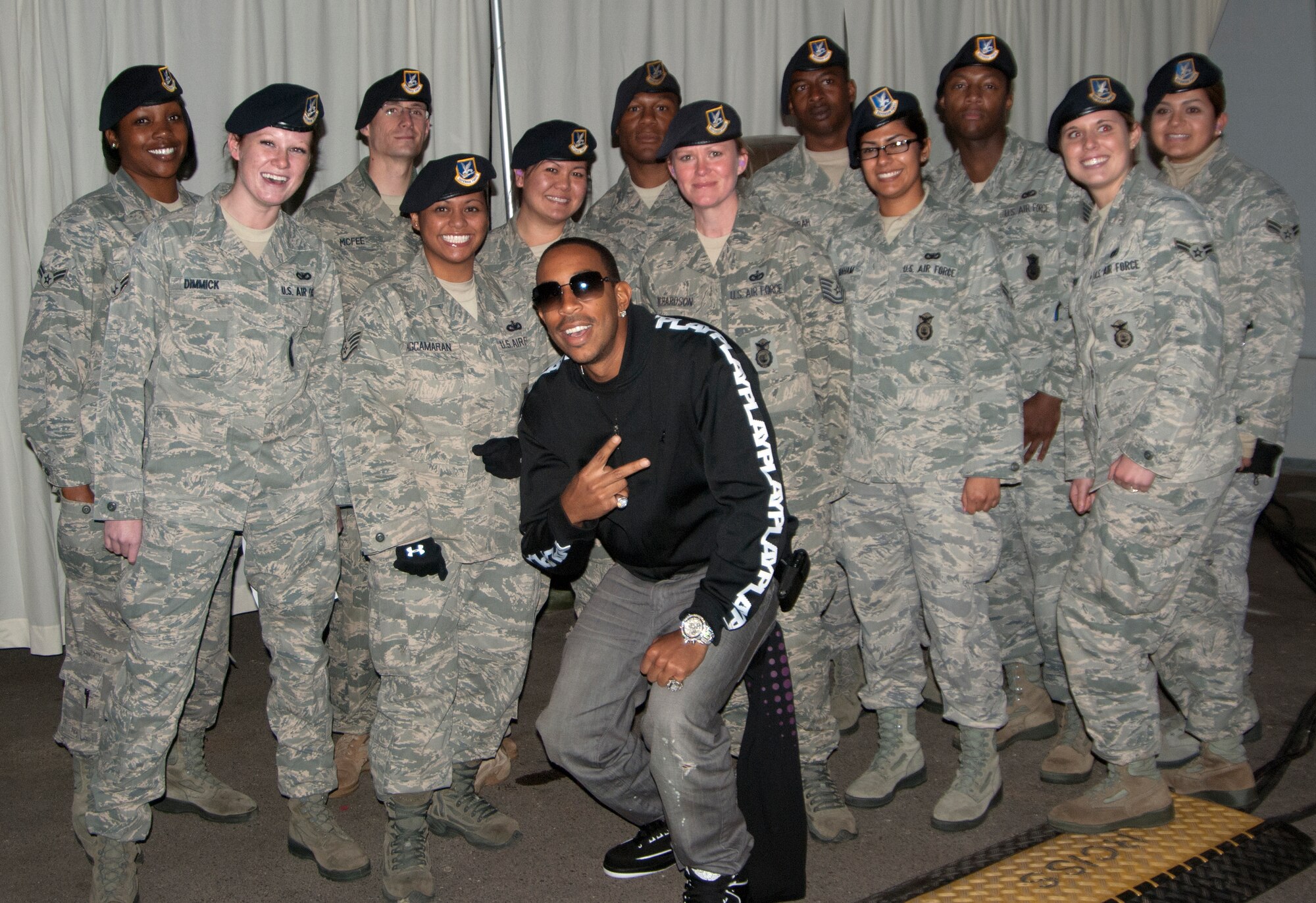 FORT MEADE, Md. -- Grammy-winning rapper, Ludacris, backed up by vocals from fellow rapper, Lil Fate, performs for a crowd of over 1,000 servicemembers, federal employees, friends and family here Nov. 6.  Ludacris partnered with the Air Force Reserve Command Recruiting Service and Blaine Warren Advertising to host a special event for servicemembers and potential Air Force Reservists as part of the recruiting service initiative, "Get 1 Now - Refer a Friend Tour." Members of the 11th Wing Security Forces Squadron, Joint Base Andrews, Md., volunteered to provide artist/event security (U.S. Air Force photo/ Capt. Rebecca A. Garcia).