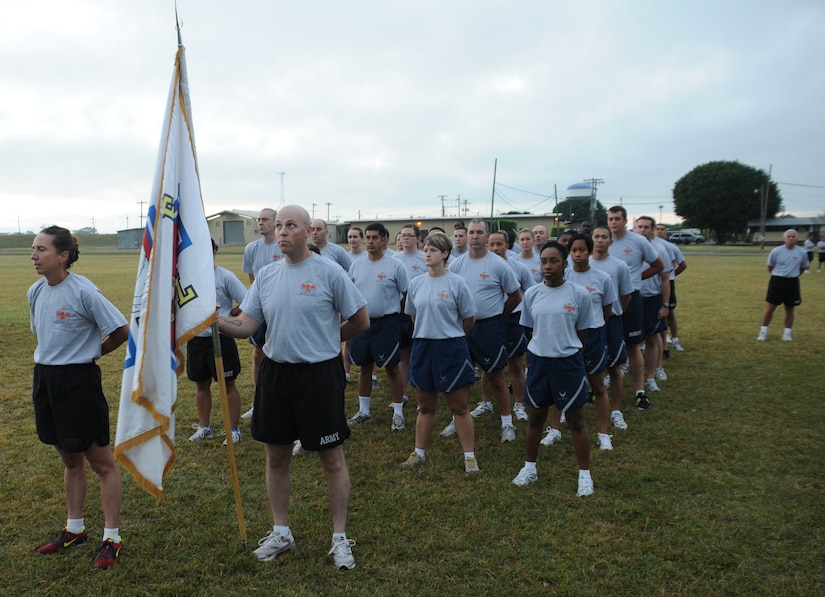 SOTO CANO AIR BASE, Honduras --  Standing at parade rest, the Medical Element waits for the Joint Task Force-Bravo Run to begin here Nov. 10. The two-mile monthly run brings all of JTF-Bravo together to run in formation. (U.S. Air Force photo/Tech. Sgt. Benjamin Rojek)