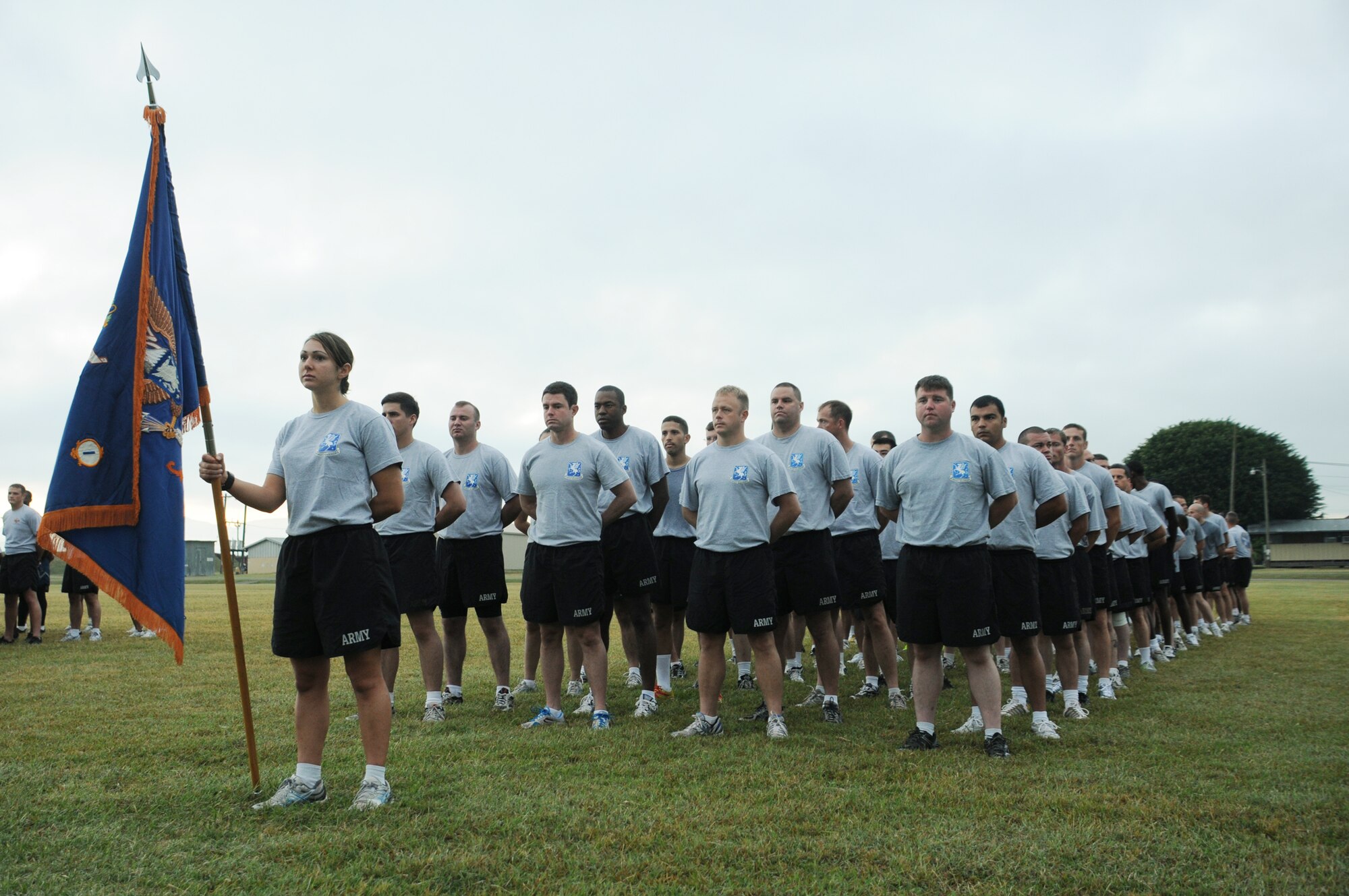 SOTO CANO AIR BASE, Honduras --  Standing at parade rest, the 1-228th Aviation Regiment waits for the Joint Task Force-Bravo Run to begin here Nov. 10. The two-mile monthly run brings all of JTF-Bravo together to run in formation. (U.S. Air Force photo/Tech. Sgt. Benjamin Rojek)