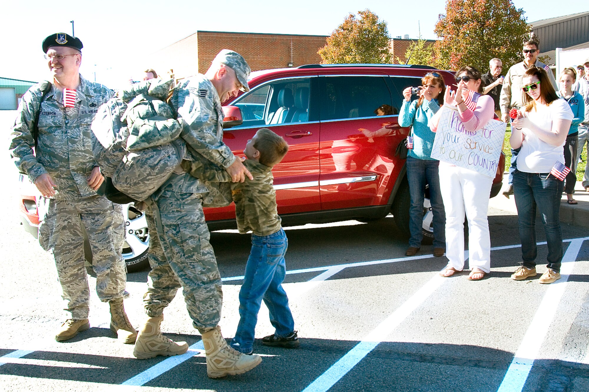 Staff Sgt Edward Rollyson is greeted by his son Dalton upon his arrival to the 167th Airlift Wing on November 10, 2010. Staff Sgt Rollyson was one of twenty four airmen assigned to the 167th Security Forces Squadron returning home from a six month deployment to Saudi Arabia. (U.S. Air Force photo by Master Sgt Emily Beightol-Deyerle)

