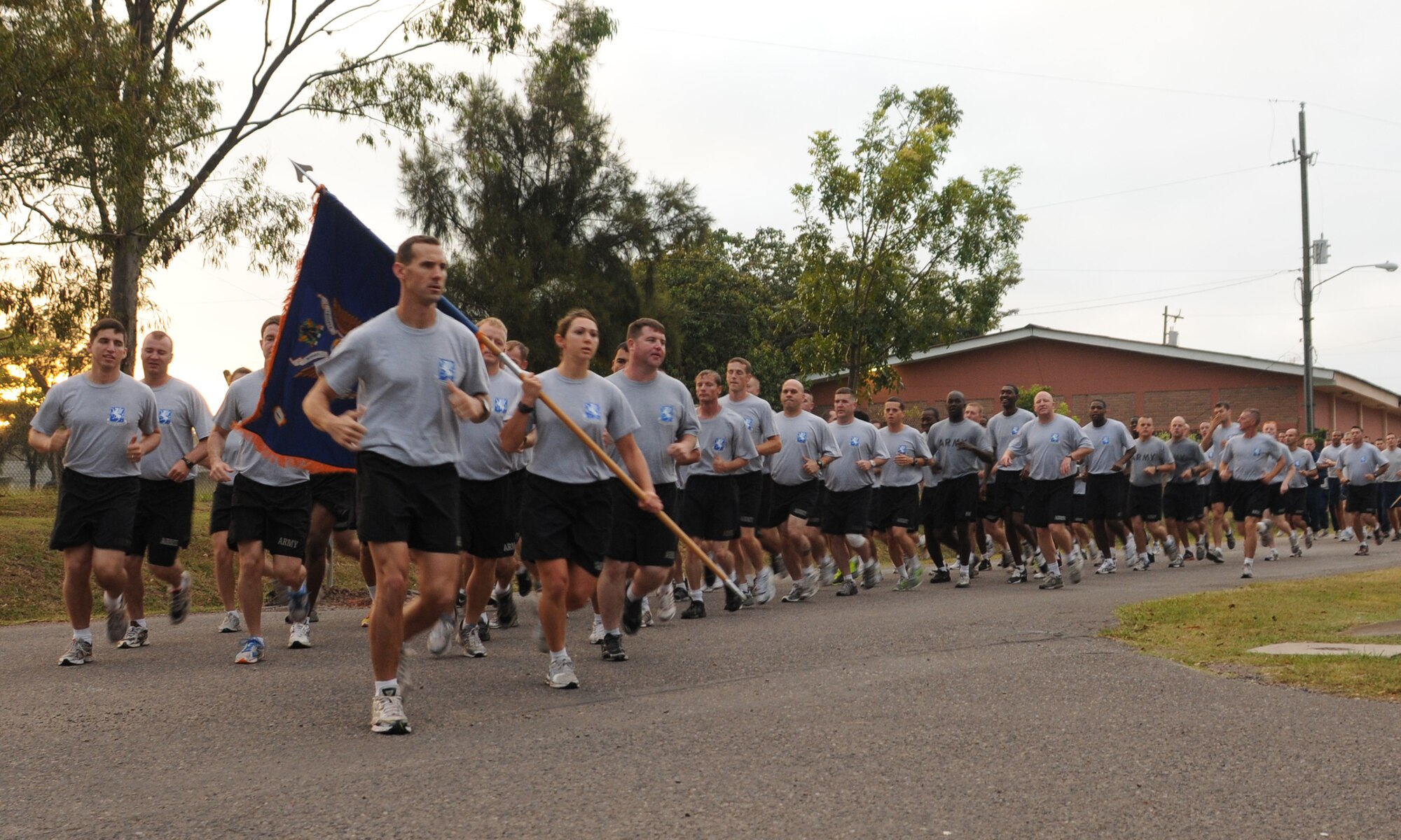 SOTO CANO AIR BASE, Honduras -- The 1-228th Aviation Regiment runs in formation as part of the monthly Joint Task Force-Bravo Run here Nov. 10. The run encourages a fitness lifestyle and esprit de corps. (U.S. Air Force photo/Tech. Sgt. Benjamin Rojek)