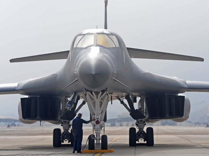 A member from the 28th Aircraft Maintenance Squadron from Ellsworth Air Force Base, S.D., checks the B-1B Lancer aircraft before take-off on Barksdale AFB, La. Nov. 9. Green Flag East is Air Combat Command's premier close-air-support exercise. (U.S. Air Force photo/Senior Airman Alexandra M. Boutte)