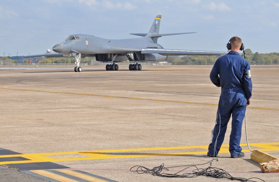 Airman 1st Class David Shelby, 28th Aircraft Maintenance Squadron from Ellsworth Air Force Base, S.D., waits for a B-1B Lancer to taxi before placing chocks at its wheels at Barksdale AFB, La. Nov. 9. Unlike previous Green Flag East Exercises, this is a first for B-1s. (U.S. Air Force photo/Senior Airman Alexandra M. Boutte)