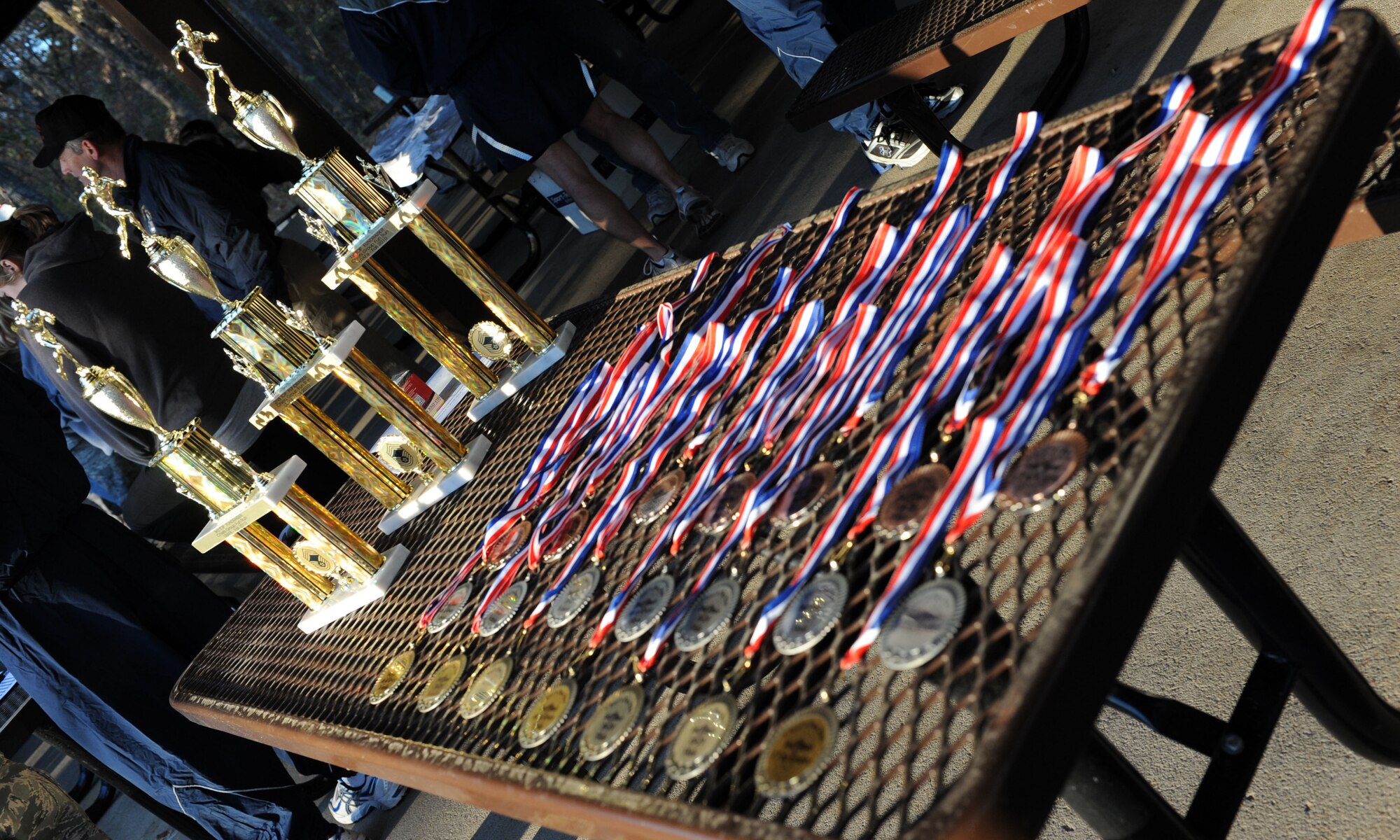 Medals await the finalists during the Chief’s Group fun run Nov. 5. Money raised during the annual event supports various base programs, such as base dining-ins, sharp troop awards and Airman Leadership School graduations. (U.S. Air Force photo by Airman 1st Class Ellora Stewart)