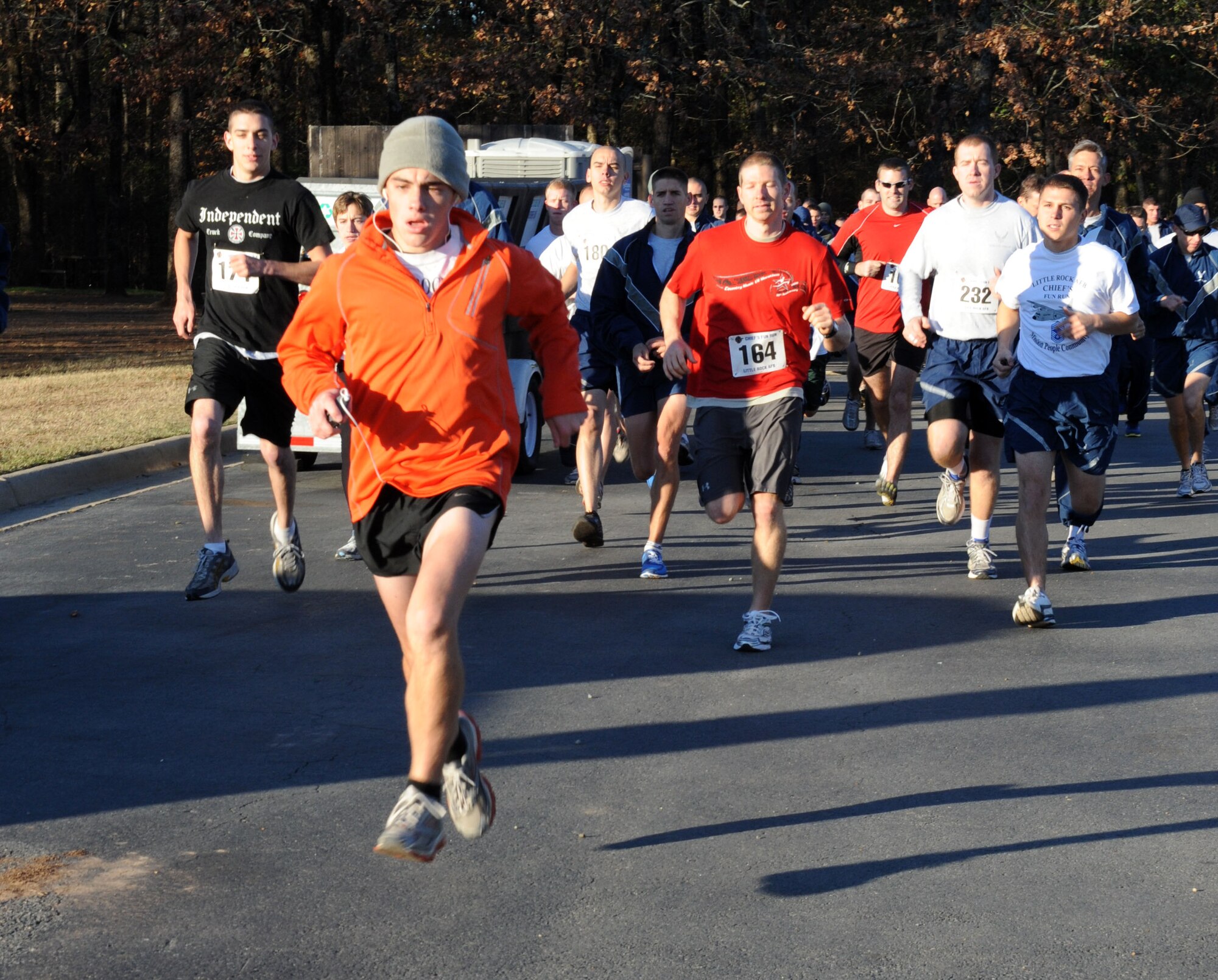 Members of Team Little Rock take off from the starting line during the Chief’s Group fun run Nov. 5. Money raised during the annual event supports various base programs, such as base dining-ins, sharp troop awards and Airman Leadership School graduations. (U.S. Air Force photo by Airman 1st Class Ellora Stewart)