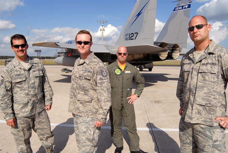 American Attitude, from left: Air National Guardsmen Master Sgt. Marc Myers and Air Force Tech. Sgt. Chris Henderson, Navy Reserve Petty Officer 1st Class Matt Smithers and Air National Guardsman Master Sgt. Shawn Watchhorn. (U.S. Air Force photo/Master Sgt. Thomas Kielbasa)