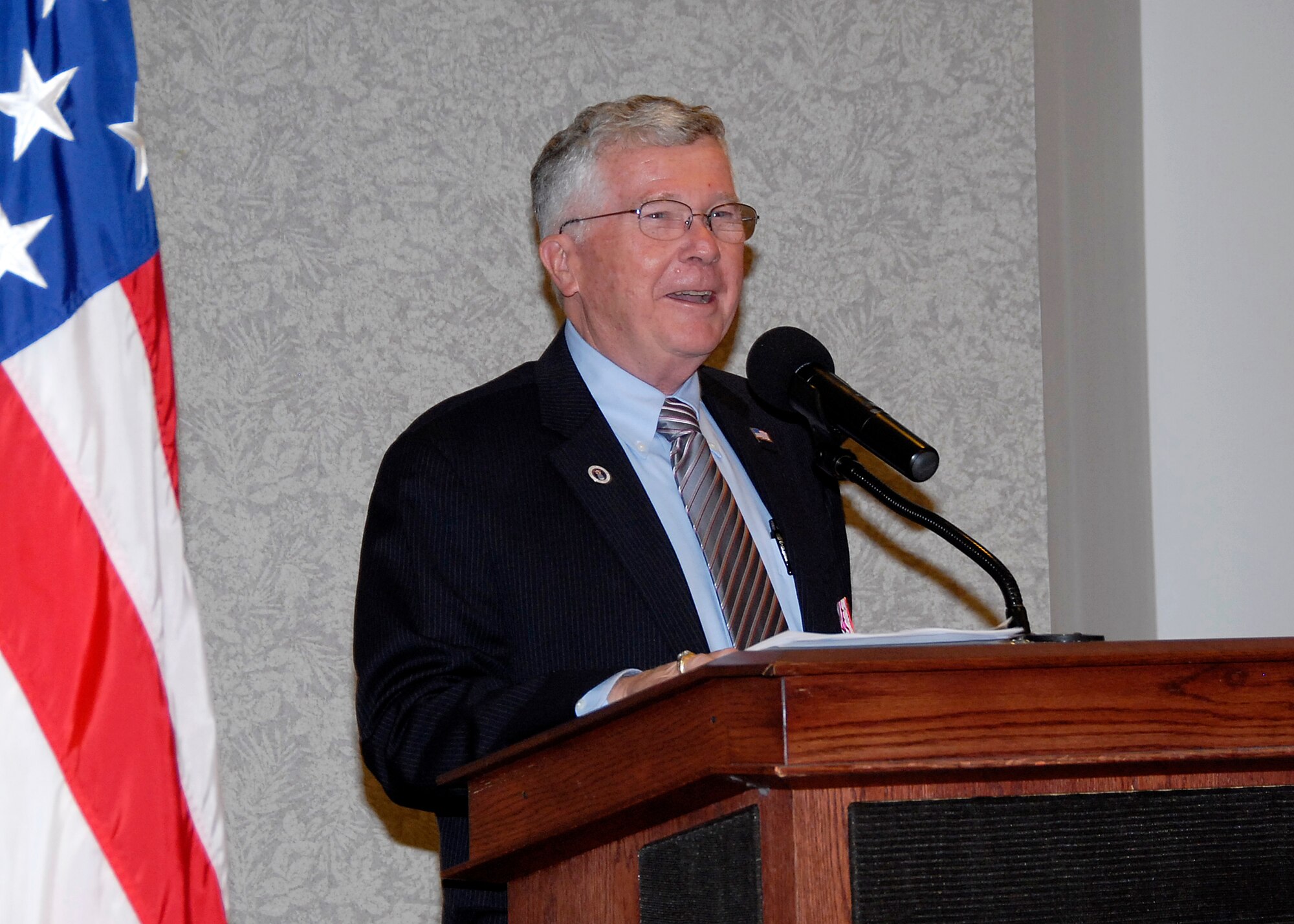 Retired Air Force Chief Master Sgt. Thomas H. Taylor, former senior enlisted advisor for the Sheppard Technical Training Center from January 1989 to October 1991, speaks to the audience Nov. 9 during Sheppard's annual Veteran's Day Luncheon. The chief emphasized the importance of taking care of veterans and those currently serving, especially those families who have someone deployed. (U.S. Air Force photo/Mike Litteken)