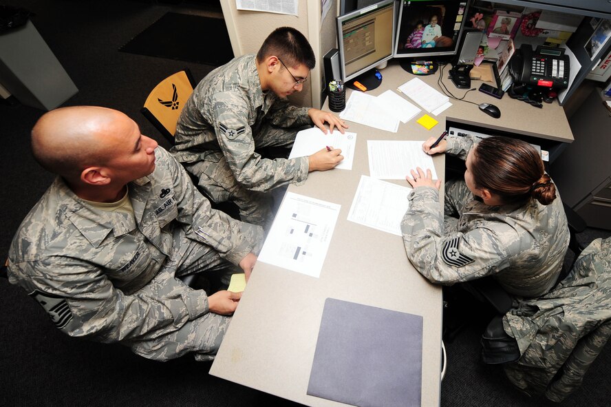 Tech. Sgt. Jennifer Jackson, dorm manager, explains dormitory rules to Airman 1st Class Brian Valdivieso, 2nd Aircraft Maintenance Squadron, and Master Sgt. Jason Weaver, 2nd Communications Squadron first sergeant, during a dorm assignment briefing at Barksdale Air Force Base, La., Nov. 9. Following initial dorm assignment, airmen must complete a comprehensive checklist to ensure all pre-existing discrepancies are accounted for, all furniture is present and accept responsibility for the room and its contents. (U.S. Air Force photo/Senior Airman Joanna M. Kresge)