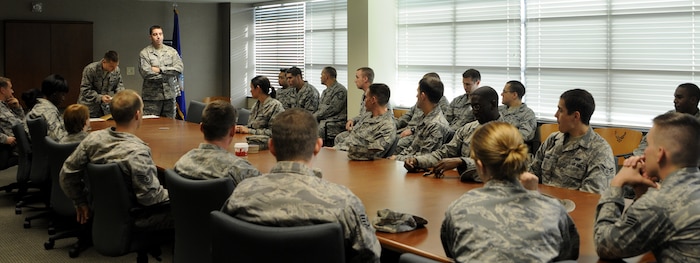 Master Sgt. Steven Hart, 628th Communication Squadron first sergeant, relays important information to his troops during a meeting Nov. 5, 2010. One of the most important duties of a First Shirt is to ensure that their troops have the essential information to carry-out their daily operations. (U.S. Navy photo/Mass Communication Specialist 1st Class Jennifer R. Hudson)