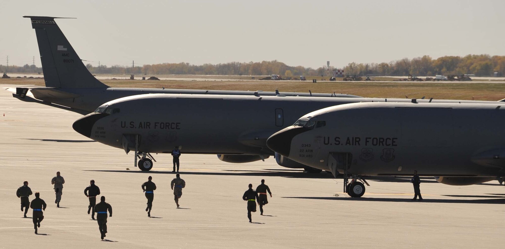 Team McConnell flight crew members respond during an exercise Nov. 6, 2010, McConnell Air Force Base, Kan. McConnell practiced its operational readiness in support of combat commanders. As the largest tanker base in the world, McConnell supports many operations globally year round. (U.S. Air Force photo/Senior Airman Abigail Klein)