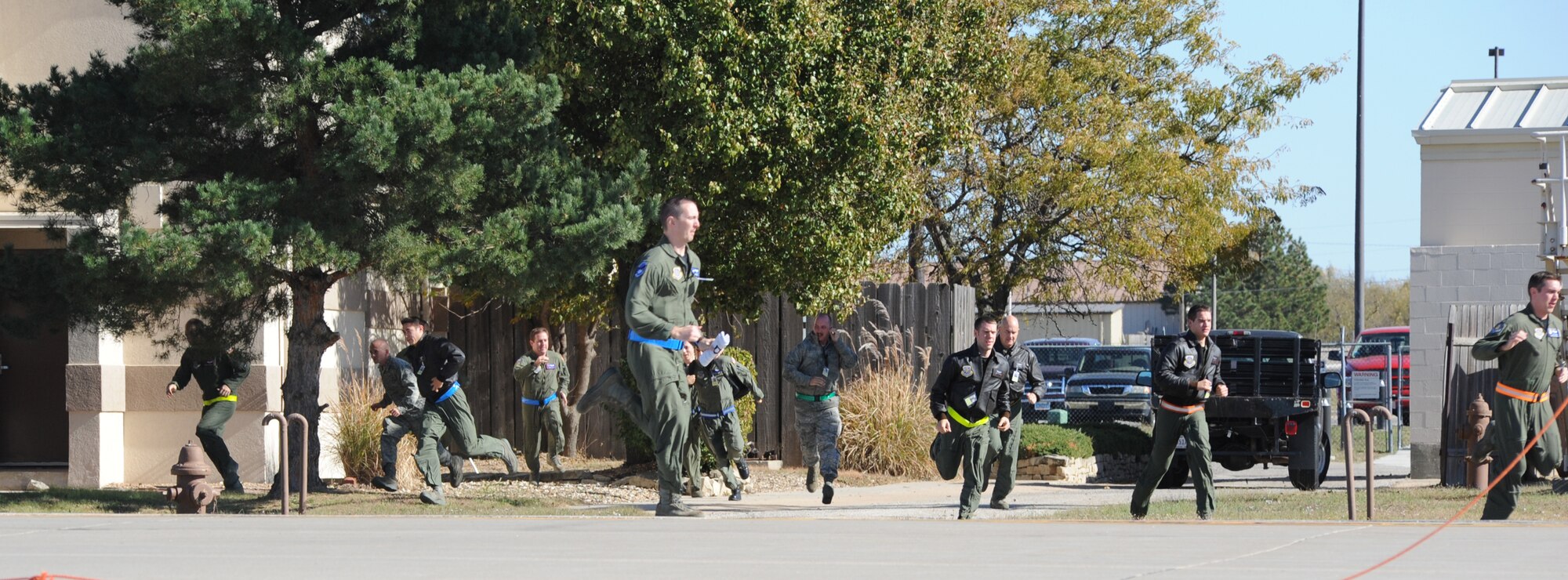 McConnell flight crew members sprint to their aircraft after receiving an alert call Nov. 6, 2010, McConnell Air Force Base, Kan. The crew members responded during an exercise supporting the U.S. Strategic Command. McConnell houses the largest tanker fleet in the world. (U.S. Air Force photo/Airman 1st Class Armando A. Schwier-Morales)
