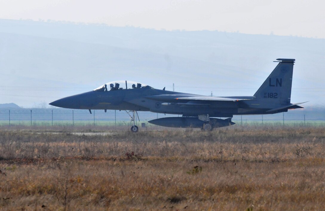 CAMPIA TURZII AIR BASE, Romania – An F-15C Eagle from the 493rd Fighter Squadron roars down the runway before taking off Nov. 2. In the rear seat is Senior Master Sgt. Michael Seelhoff, 493rd Aircraft Maintenance Unit NCO in charge, who took his first flight in the airframe he has worked on for 25 years. (U.S. Air Force photo/Senior Airman David Dobrydney)