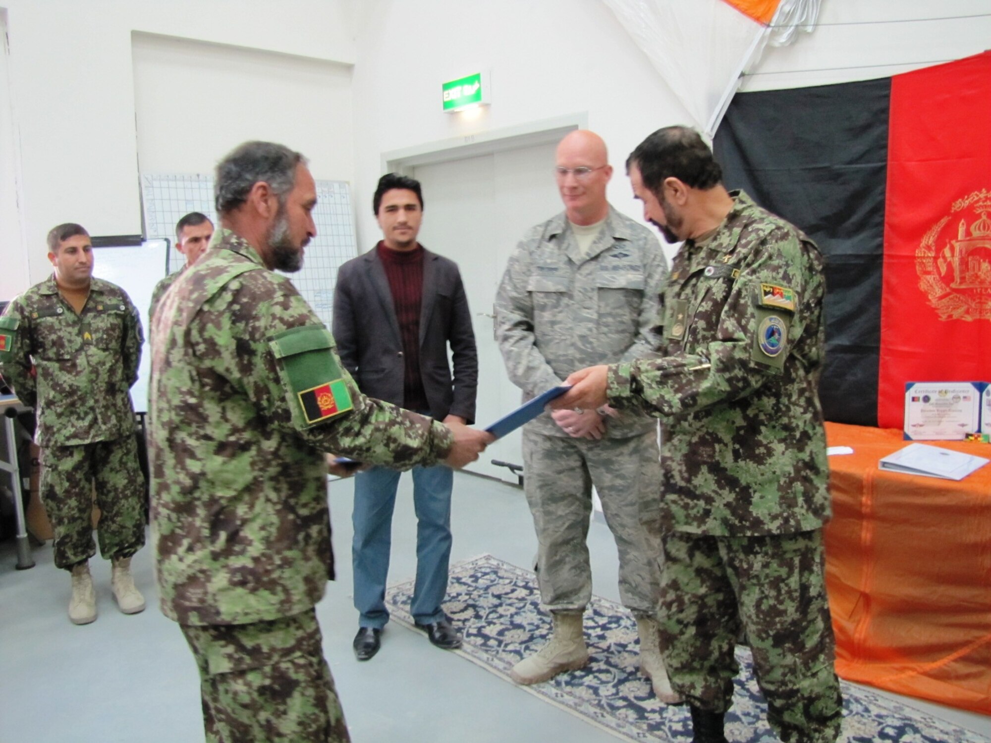 KABUL, Afghanistan - Members of the Afghan Air Force Life Support flight graduate after passing all test to earn their certificates and become the first AAF riggers on Nov 10.  (U.S. Air Force photo/RELEASED).
