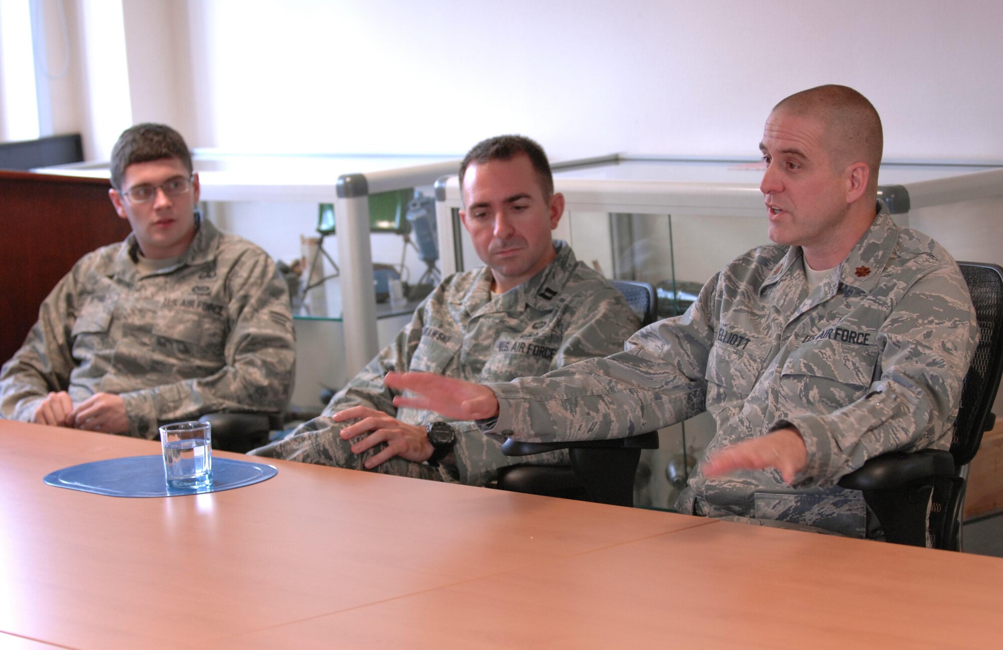 SPANGDAHLEM AIR BASE, Germany –Chaplain (Maj.) John Elliott, right, 52nd Fighter Wing, talks with 52nd Civil Engineer Squadron explosive ordnance flight members during the explosive ordnance flight safety day Nov. 5. He discussed the services chaplains offer to military members and their dependents. The activities were intended to raise awareness about the dangers of the career field and how to deal with the stress associated with it. (U.S. Air Force photo/Airman 1st Class Matthew B. Fredericks)