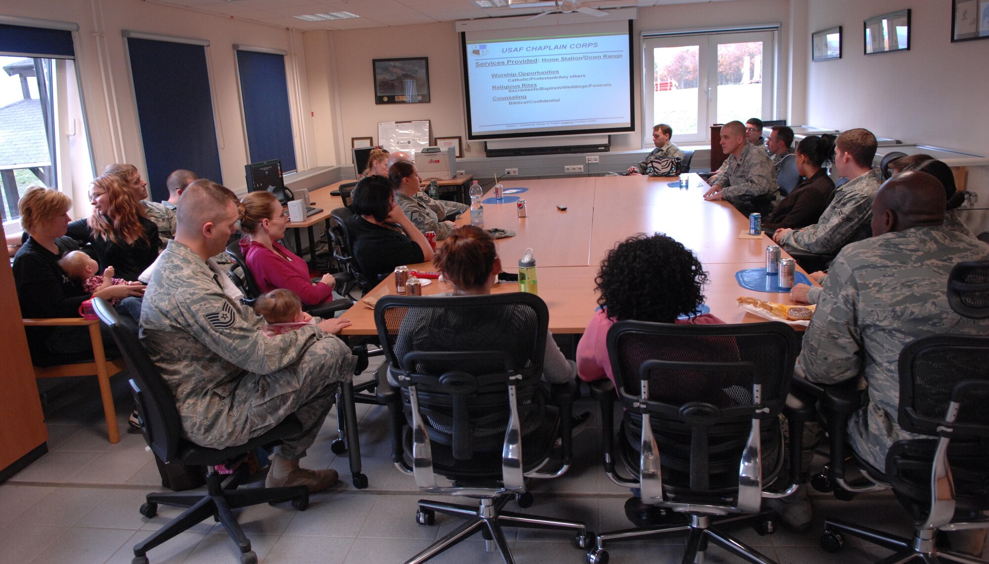 SPANGDAHLEM AIR BASE, Germany – Members of the 52nd Civil Engineer Squadron explosive ordnance flight and their families receive a briefing from Chaplain (Maj.) John Elliott, 52nd Fighter Wing Nov. 5. The activities were intended to raise awareness about the dangers of the career field and how to deal with the stress associated with it. (U.S. Air Force photo/Airman 1st Class Matthew B. Fredericks)