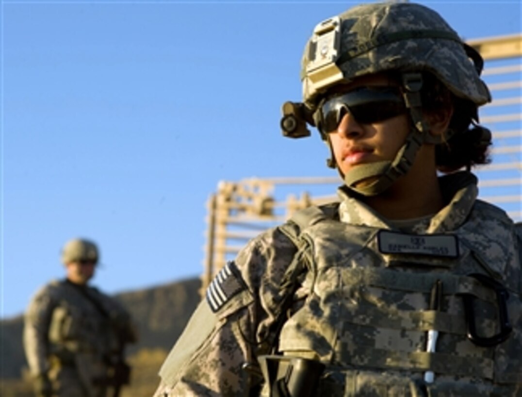 U.S. Air Force Senior Airman Danielle Robles, from the Paktia Provincial Reconstruction Team, provides security during an engineering mission in Rabat, Afghanistan, on Nov. 7, 2010.  The team facilitates the Afghan government’s ability to provide public services and development projects with the goal of weakening insurgent influence.  