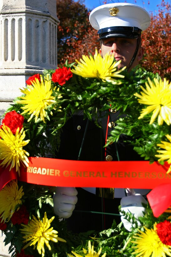 Lance Cpl. Brian Bell, Marine Corps body bearer, carries a ceremonial wreath to the grave marker of "the Grand Old Man of the Marine Corps" Brig Gen. Archibald Henderson for the 235th birthday of the Corps, Nov. 10, 2010. Henderson remains the longest serving commandant the Corps has ever seen. Marine Barracks Washington Marines spent the morning honoring those previous commandants whose graves reside in the metropolitan area.