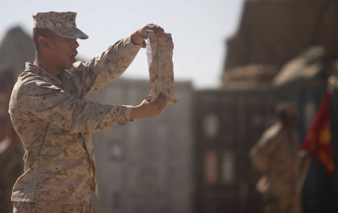 The Combat Logistics Battalion 3, 1st Marine Logistics Group (Forward) Color Guard stands at attention during a ceremony aboard Camp Dwyer, Afghanistan celebrating the 235th Marine Corps birthday, Nov. 10.