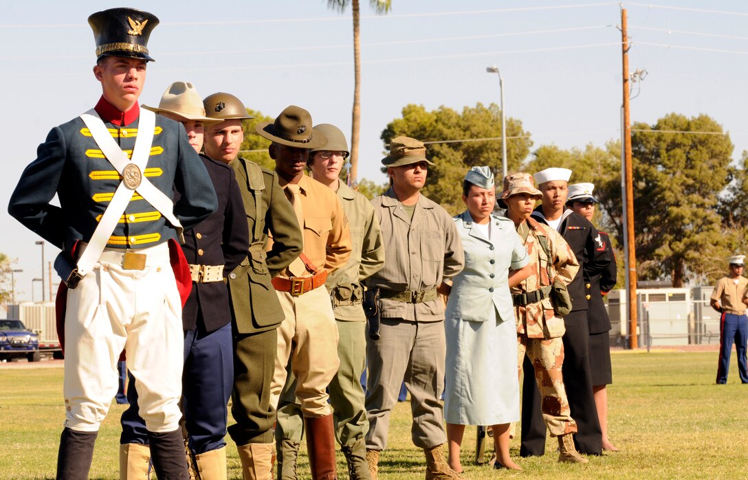 Marines and sailors display historic uniforms during the 235th Marine Corps birthday pageant at the Marine Corps Air Station in Yuma, Ariz., Nov. 10, 2010.