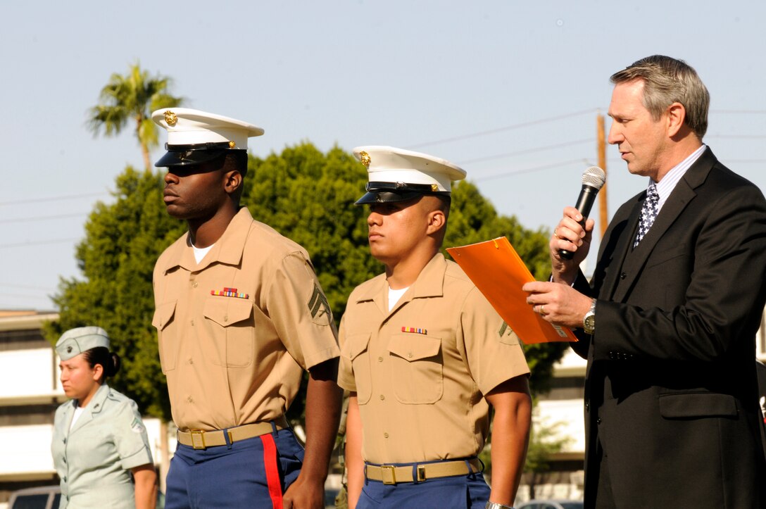 Following the ceremony, Jamaica native Cpl. Orrett Dennis, Marine Aviation Logistics Squadron 13 supply clerk, and Mexico native Lance Cpl. Andres Amaya, Headquarters and Headquarters Squadron administrative clerk, received their U.S. citizenship in a ceremony held by immigration service officials on the station parade field at Marine Corps Air Station in Yuma, Ariz. on Nov. 10, 2010, in celebration of the Corps' 235th birthday.