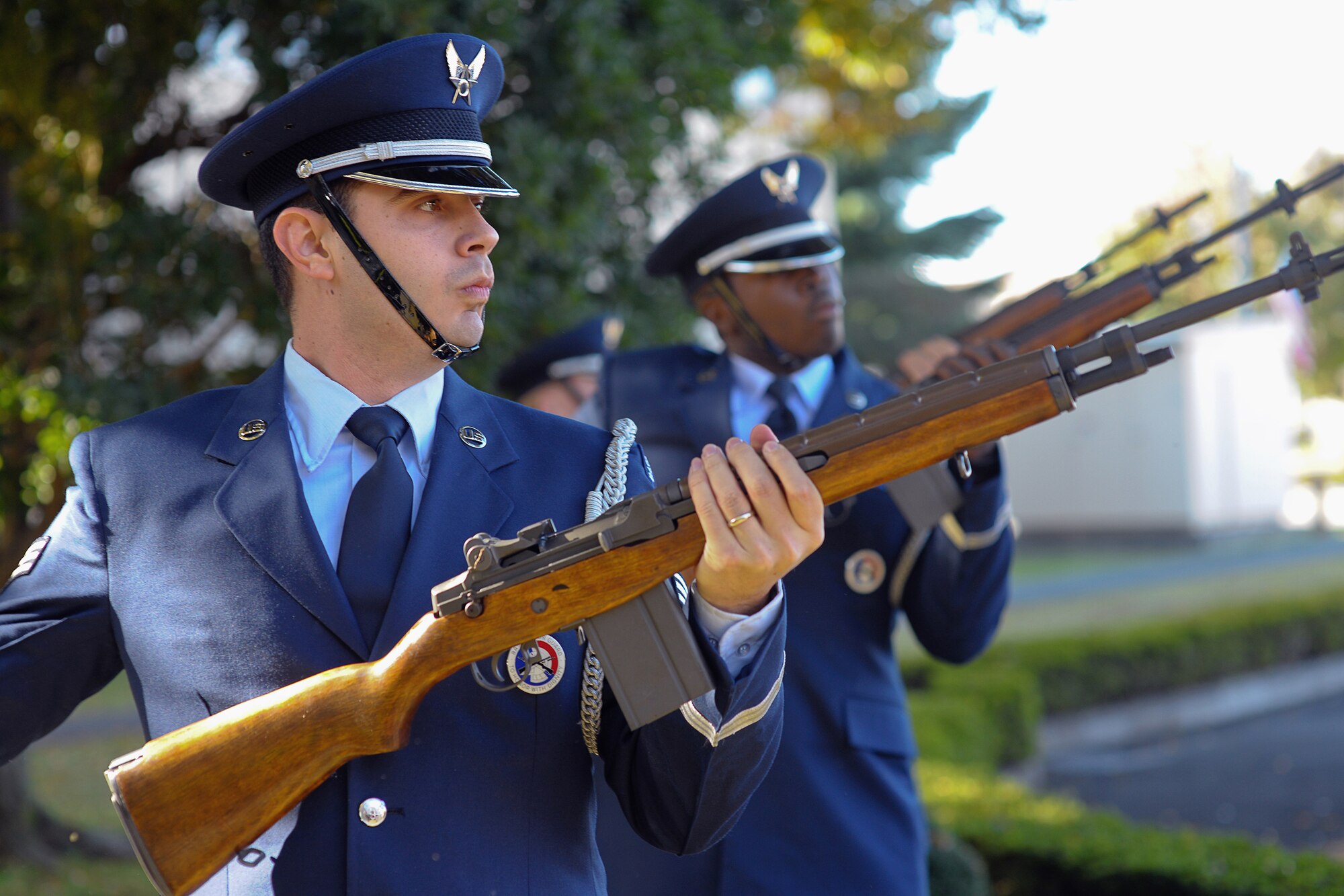 YOKOTA AIR BASE, Japan -- Senior Airman James Porath, 374th Logistics Readiness Squadron, releases trigger during the firing party.  Yokota Airmen, Boy Scouts, and Veterans participated in the Veterans Day Ceremony here Nov. 11.  (U.S. Air Force photo/Osakabe Yasuo) 