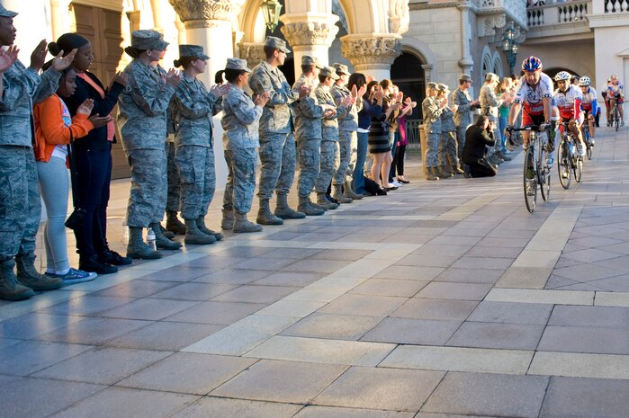 LAS VEGAS -- Duane Wagner co-founder of the group "Ride 2 Recovery" leads a group of veterans biking through a welcome line of Nellis Air Force Base Nev., personnel at The Venetian on Veteran's Day, Nov. 11, 2010. Ride 2 Recovery was started primarily to provide fund raising and support to wounded and disabled veterans from the two Gulf Wars, though all wounded veterans are welcome. (U.S. Air Force Photo / Airman 1st Class Jamie Nicley)(Released)