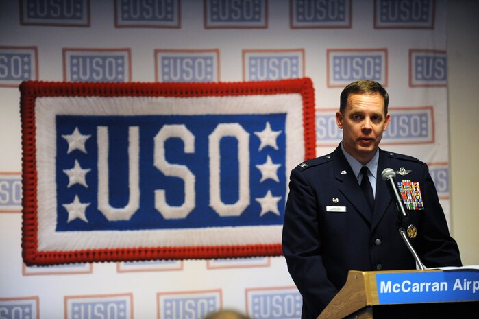 LAS VEGAS -- Col. Steven Garland, 99th Air Base Wing commander, gives a speech during the new USO grand opening at McCarran International Airport, Nov. 11. All branches of the U.S. military were in attendance of the grand opening. (U.S. Air Force Photo by Senior Airman Brett Clashman/Released)
