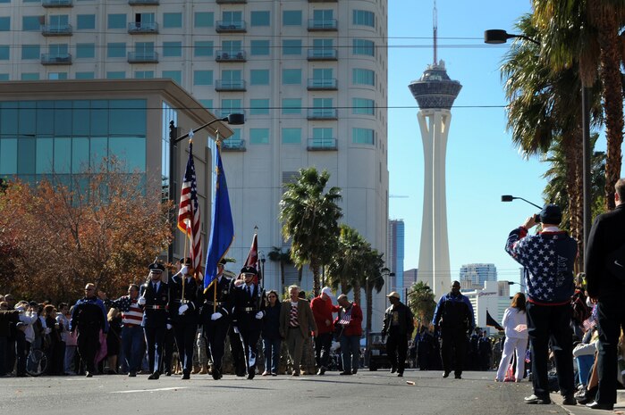 LAS VEGAS -- Nellis Air Force Base, Nev., Honor Guard carry the colors while leading the Las Vegas Veterans Day Parade Nov. 11, 2010. Airmen from the U.S. Air Force Honor Guard also participated in the parade. (U.S. Air Force photo / Airman 1st Class Daniel Hughes)(Released)

