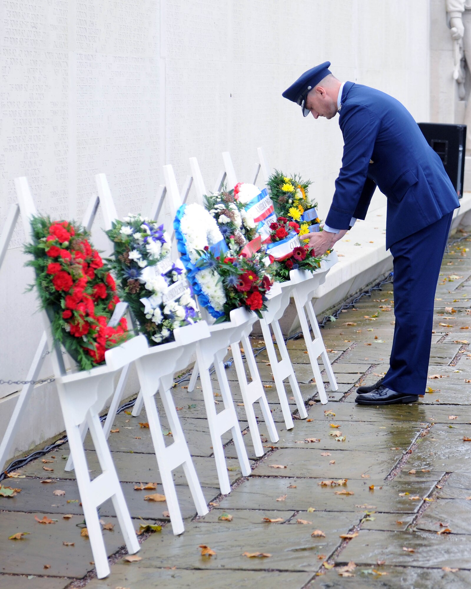 CAMBRIDGE - Colonel Timothy Cashdollar, 501st Combat Support Wing commander, lays the wing wreath during a Veteran's Day ceremony at Madingley American Cemetery Nov. 11. (U.S. Air Force photo by Staff Sgt. Joel Mease)