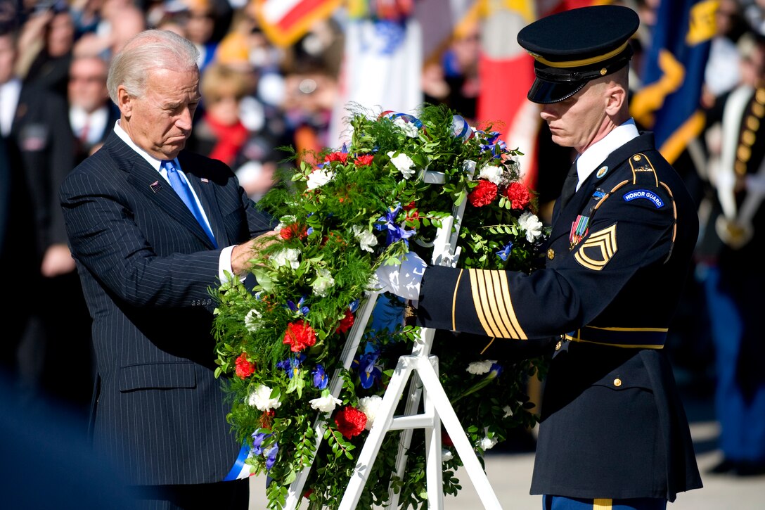 Vice President Joe Biden lays a wreath at the Tomb of the Unknowns at Arlington National Cemetery in Arlington, Va., Nov. 11, 2010.