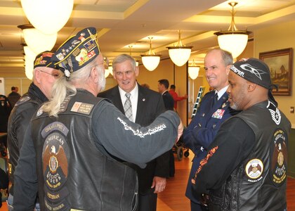 BELLEVUE, Neb. - Gen. Kevin Chilton, U.S. Strategic Command commander, and Bob Hinson, a retired Air Force lieutenant general, strike up conversation with members of the American Legion Riders during a Veterans Day ceremony held at the Eastern Nebraska Veterans&#039; Home Nov. 11. (U.S. Air Force photo)