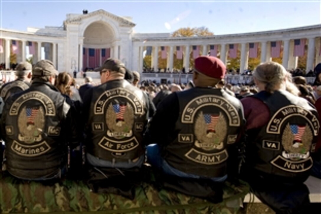 Veterans from the Marines, Air Force, Army and Navy attend a Veterans Day ceremony at Arlington National Cemetery in Arlington, Va., Nov. 11, 2010.