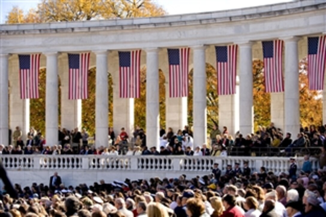 Veterans attend a Veterans Day ceremony at Arlington National Cemetery in Arlington, Va., Nov. 11, 2010.