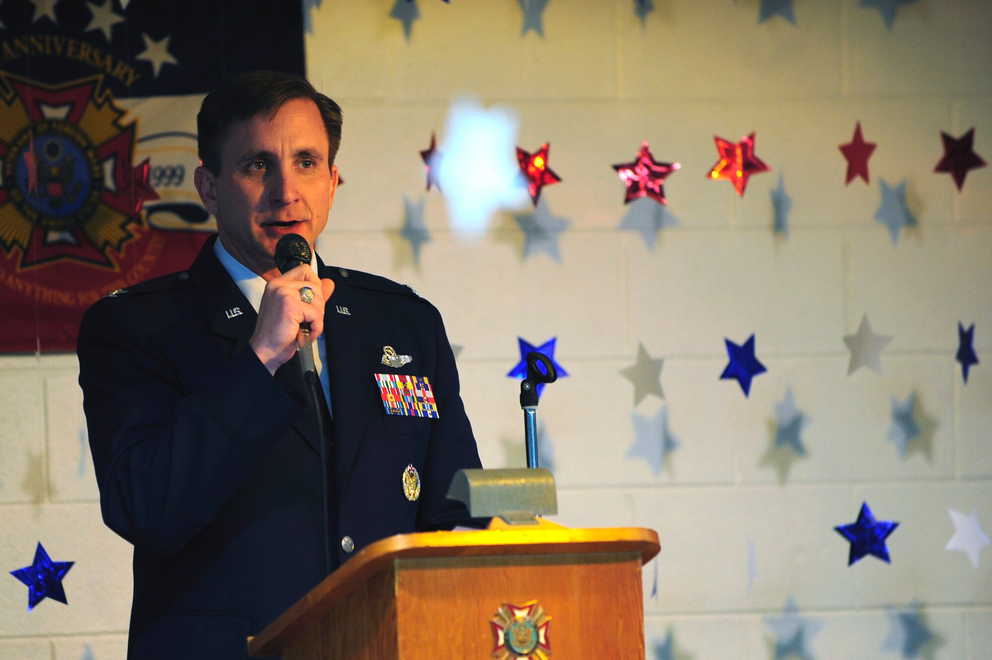 Col. Jeffrey Taliaferro, 28th Bomb Wing commander, discusses the importance of Veterans Day at Veterans of Foreign Wars post 1273 in Rapid City, S.D., Nov. 11.  During his speech Col. Taliaferro praised and thanked the spouses of all service members and veterans.