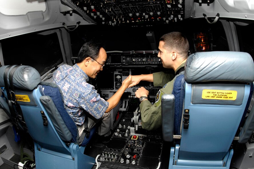 JOINT BASE PEARL HARBOR-HICKAM, Hawaii - Consulate General of Japan Yoshihiko Kamo greets Capt. Joseph Monaco, 15th Wing executive officer, before a C-17 simulator demonstration, Nov. 10. Consul General Kamo visited 13th Air Force headquarters and the 15th Wing during his visit to Joint Base Pearl Harbor-Hickam. (Photo by David D. Underwood Jr.)
