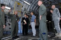 JOINT BASE PEARL HARBOR-HICKAM, Hawaii - Senior Master Sgt. Terry Topouzoglou, 535th Airlift Squadron superintendent, explains the capabilities of the C-17 to Consulate General of Japan Yoshihiko Kamo, Nov. 10. Consul General Kamo visited 13th Air Force headquarters and the 15th Wing during his trip to Joint Base Pearl Harbor-Hickam. (Photo by David D. Underwood Jr.)