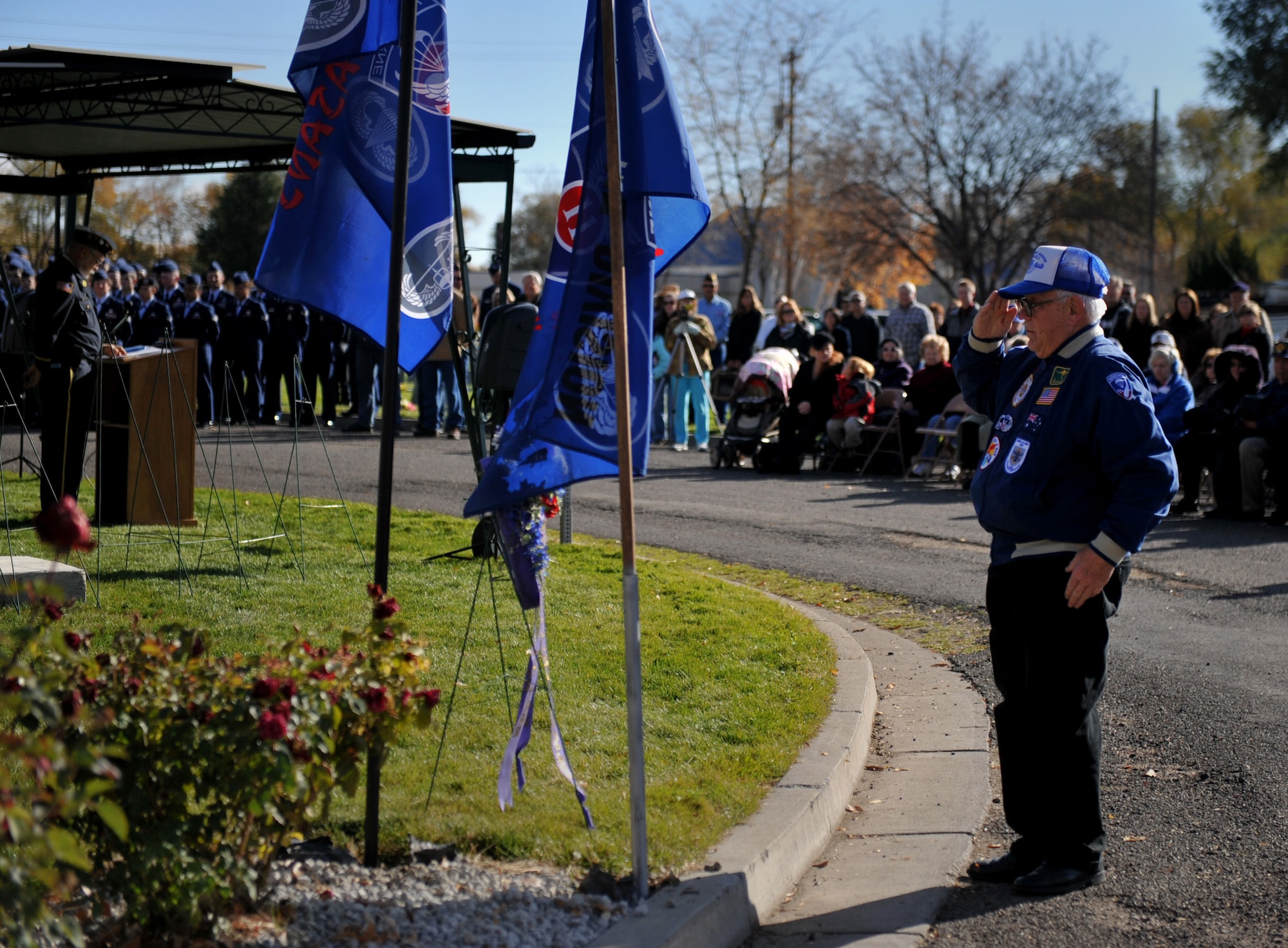 MOUNTAIN HOME, Idaho – Dwight Pangborn, American Airborne Association, renders a salute during a wreath presentation Nov. 11 at the Mountain View cemetery here.  The presentation was part of the 2010 Veterans Day ceremony where more than 100 servicemembers and civilians joined together in honor of all U.S. servicemembers. (U.S. Air Force photo by Staff Sgt. Alyssa C. Wallace)(Released)