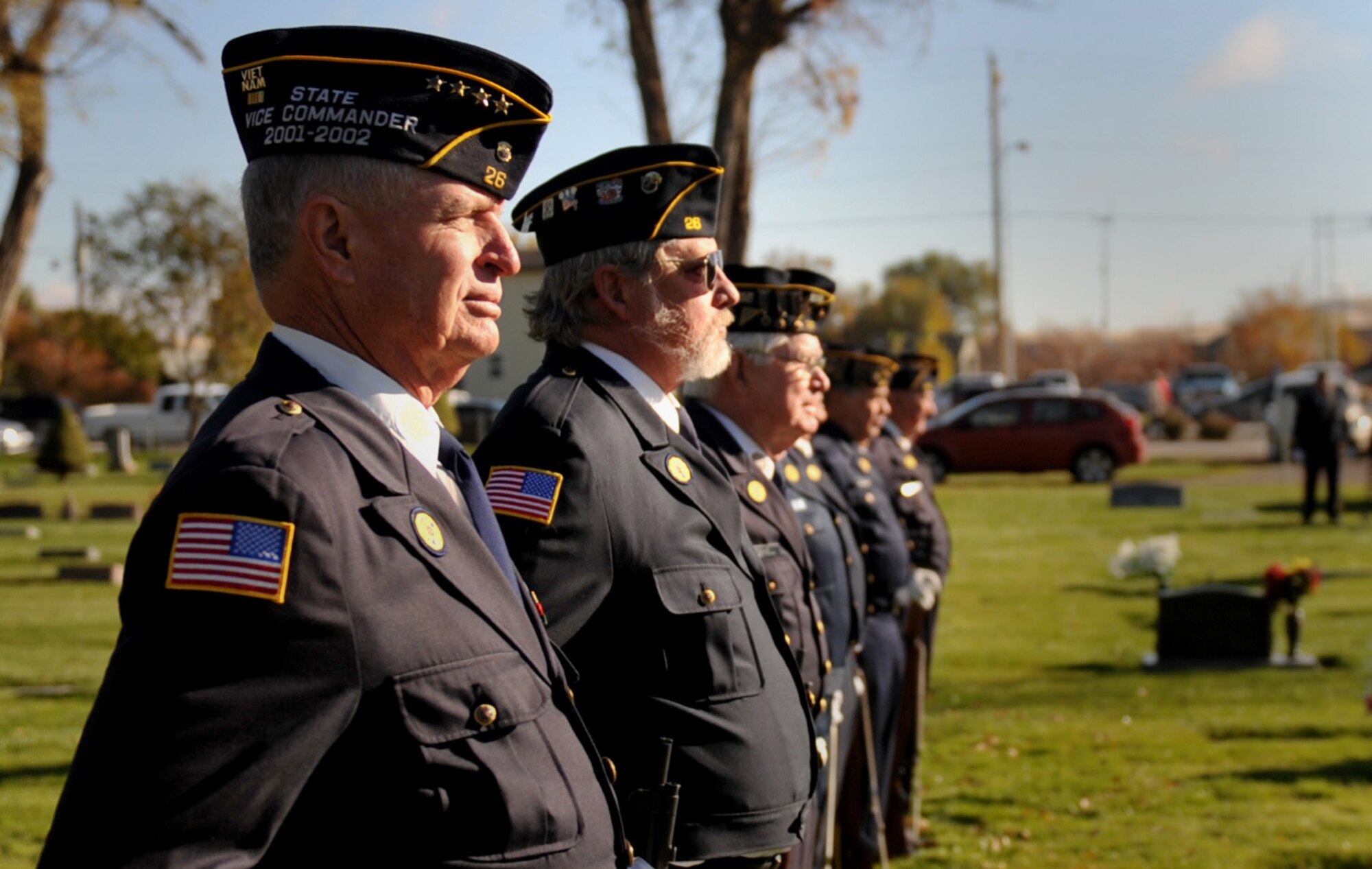 MOUNTAIN HOME, Idaho – Members of the American Legion Post 26 Honor Guard stand at attention during the 2010 Veterans Day ceremony held at the Mountain View Cemetery here Nov. 11. More than 100 servicemembers and civilians joined together in honor of all U.S. servicemembers. (U.S. Air Force photo by Staff Sgt. Alyssa C. Wallace)(Released)