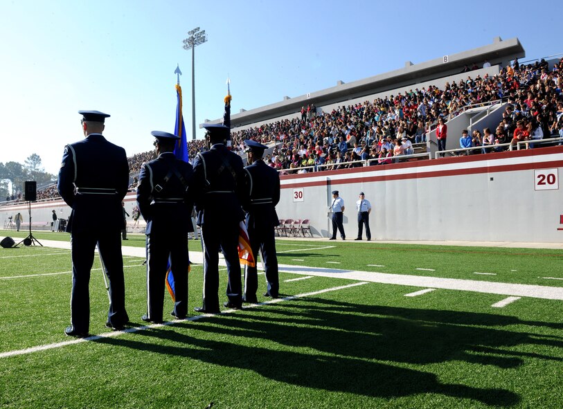 VALDOSTA, Ga. -- The Moody Air Force Base Honor Guard prepares to march onto the Martin Stadium at Lowndes High School football field and present the colors during the Valdosta Lowndes Annual Day ceremony Nov. 11. Students, teachers and members from the local community came to the ceremony to honor veterans. (U.S. Air Force photo/Airman 1st Class Benjamin Wiseman)(RELEASED)