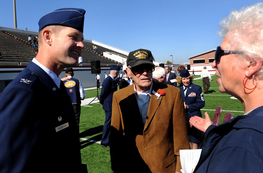 VALDOSTA, Ga. -- Col. Gary Henderson, 23rd Wing commander, speaks with retired Maj. Holbert Hodge and his wife Verna after the Valdosta Lowndes Annual Veteran’s Day ceremony Nov. 11. Mr. Hodge fought as a U.S. Army soldier in World War II from 1945 through 1948. He then commissioned into the Air Force, serving 17 more years before retiring. (U.S. Air Force photo/Airman 1st Class Benjamin Wiseman)(RELEASED)