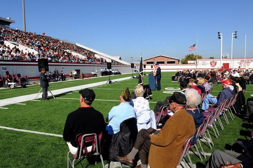 VALDOSTA, Ga. -- Col. Gary Henderson, 23rd Wing commander, speaks to a large crowd of students and teachers from , Valdosta High School, Lowndes High School, the local community and veterans during the Valdosta Lowndes Annual Veteran’s Day ceremony Nov. 11. Hundreds of people filled the LHS Martin Stadium to listen to the speakers during the ceremony. (U.S. Air Force photo/Airman 1st Class Benjamin Wiseman)(RELEASED)