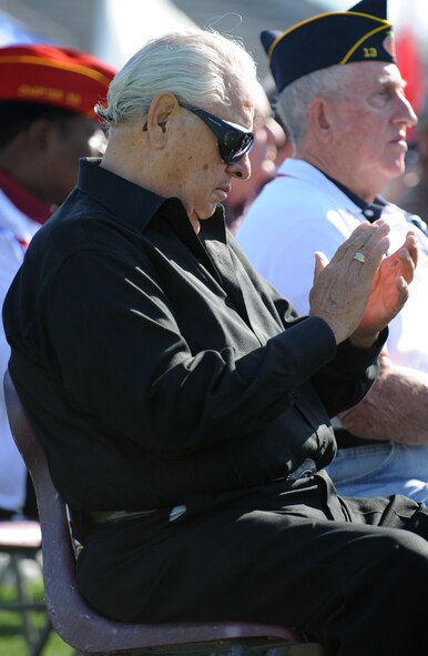 VALDOSTA, Ga. -- Gilbert Jaramillo, Air Force veteran, applauds after a speech given during the Veteran’s Day ceremony at Lowndes High School Nov. 11. Mr. Jaramillo served in the Air Force from 1949 through 1951. (U.S. Air Force photo/Airman 1st Class Douglas Ellis)(RELEASED)
