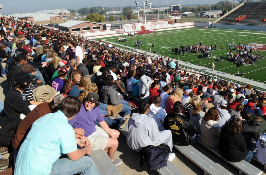 VALDOSTA, Ga. -- Students and teachers from Lowndes High School, along with other people from the local community, attend a Veteran’s Day ceremony at the LHS Martin Stadium Nov. 11. People filled the bleachers to hear speeches from past and present military veterans. (U.S. Air Force photo/Airman 1st Class Douglas Ellis)(RELEASED)