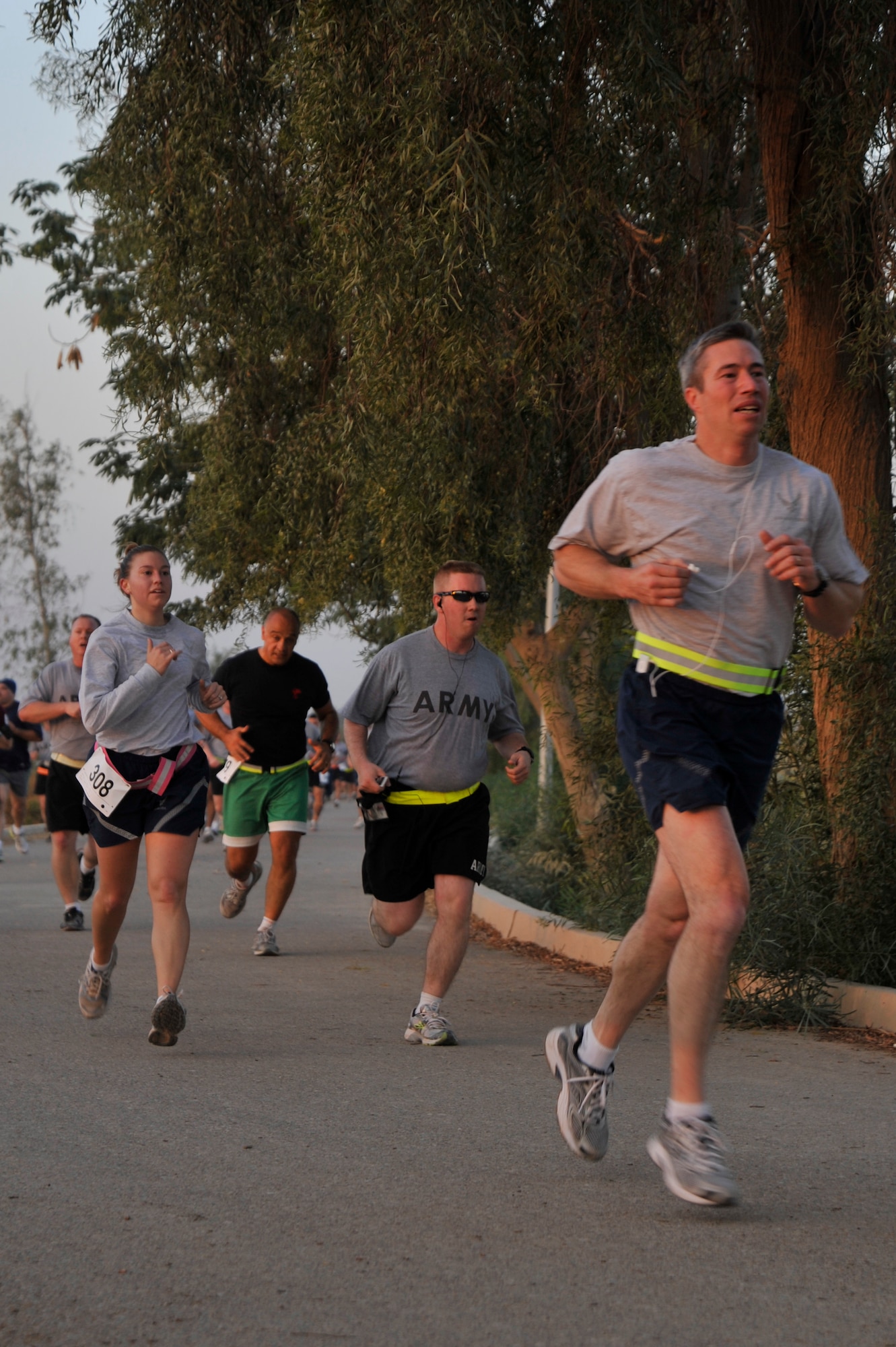 Airmen, Soldiers, Sailors, Marines and civilians participate in the Iraq Training and Advisory Mission – Air Force’s Veterans Day 5k/10k run Nov. 11, 2010, at Camp Liberty, Iraq. More than 750 military members and civilians participated in the run to honor past and present veterans. 

Men’s 5k:
1, Sembina Rabison 17 minutes, 24 seconds
2, Matthew Minck 18:29

Women’s 5K:
1, Lora Kozub 22:23
2, Jenna Sanders 23:33

Men’s 10K:
1, Sikorin Marin 35:40
2, Ray Madrid 38:10

Women’s 10K:
1, T.J. Muller 44:31
2, Allison Akdins 46:10

(U.S. Air Force photo by Senior Airman Perry Aston / Released)