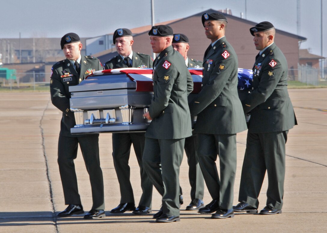 The remains of Army Spc. Blake D. Whipple, 7th Engineering Battalion, 10th Sustainment Brigade, 10th Mountain Division, Fort Drum, NY. arrive at the Niagara Falls Air Reserve Station, November 12, 2010, Niagara Falls, NY. Family, friends, military personnel and the Patriot Guard Riders were on hand at the base to show respect. (U.S. Air Force photo by Staff Sgt. Joseph McKee)