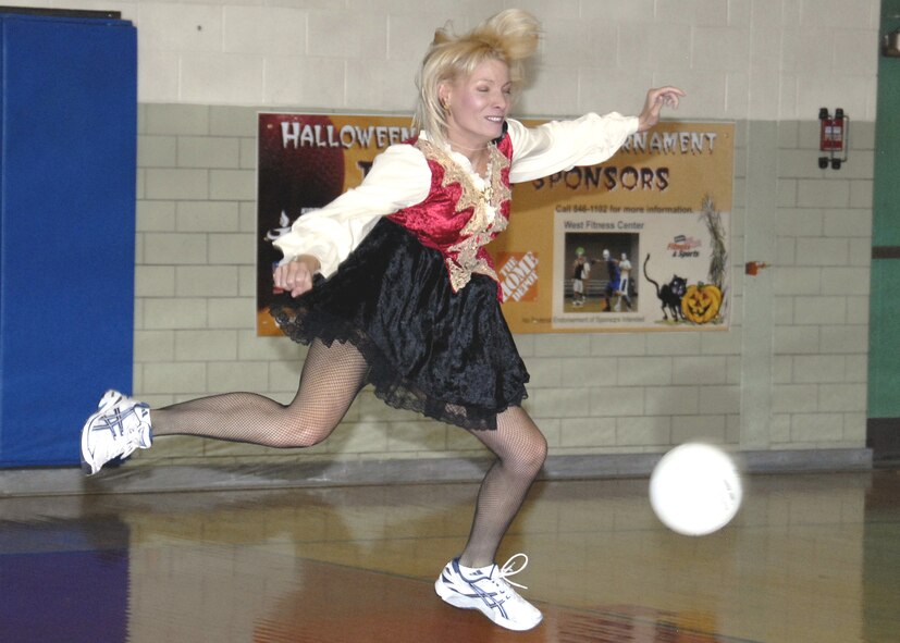 A participant jumps to avoid an incoming ball.  U.S. Air Force Photo by Barry Aguilar