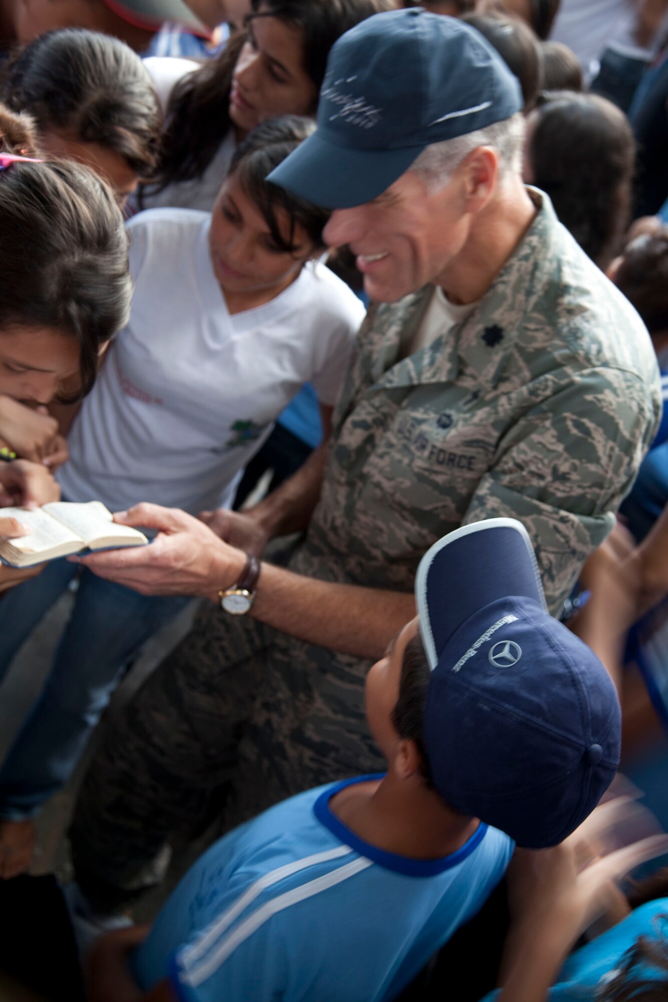 Chaplain (Lt. Col.) Ron Prosise, 140th Wing chaplain, interacts with a local student. A group of more than 15 airmen visited the local school of Eliah Maia do Rego, Natal Brazil, building community relations during CRUZEX V. During the visit the airmen interacted with the students on an informal basis; distributed small gifts and took group pictures. CRUZEX V, or Cruzeiro Do Sul (Southern Cross), is a multi-national combined exercise involving the Air Forces of Argentina, Brazil, Chile, France and Uruguay, , and observers from numerous other countries with more than 82 aircraft and almost 3,000 Airmen involved. (U.S. Air Force photo/Staff Sgt. Michael Matkin)